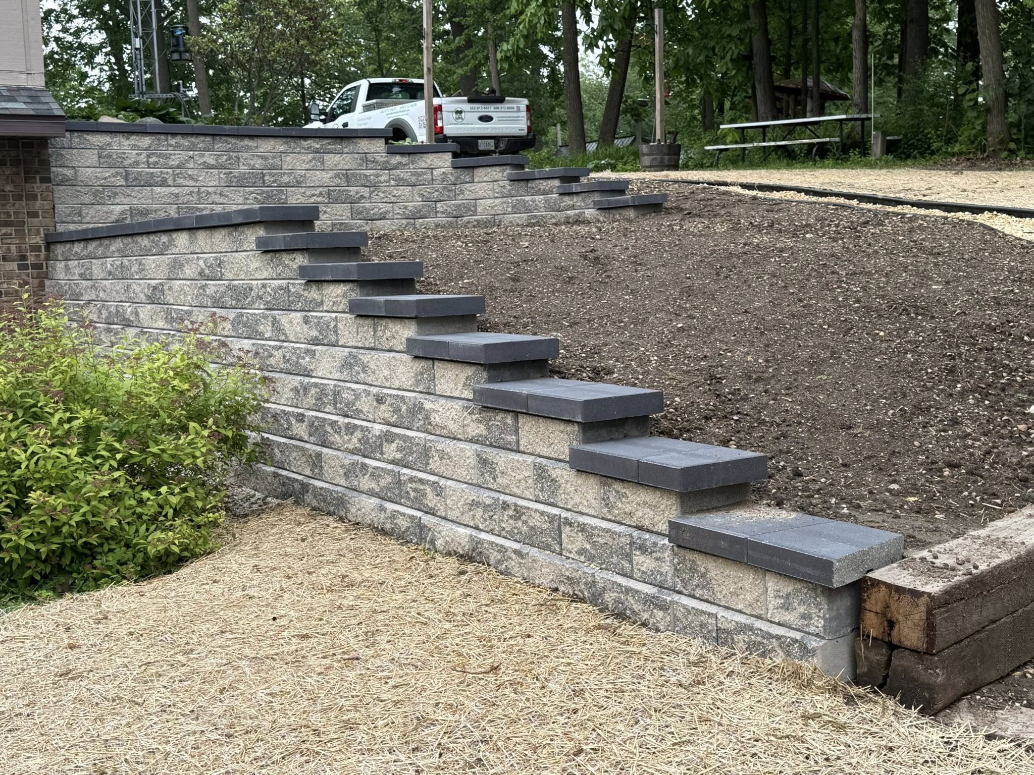 Freshly maintained lawn and landscape beds in a finished residential property